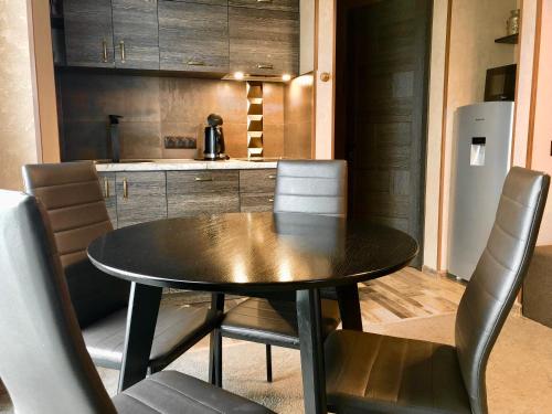 Η κουζίνα ή μικρή κουζίνα στο 2-room Apartment NFT New Gudauri 505