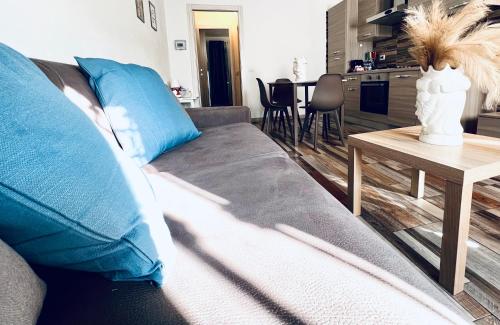 a living room with a couch and a table at Gegix's House Rho in Rho