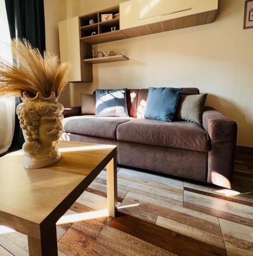 a living room with a couch and a table at Gegix's House Rho in Rho