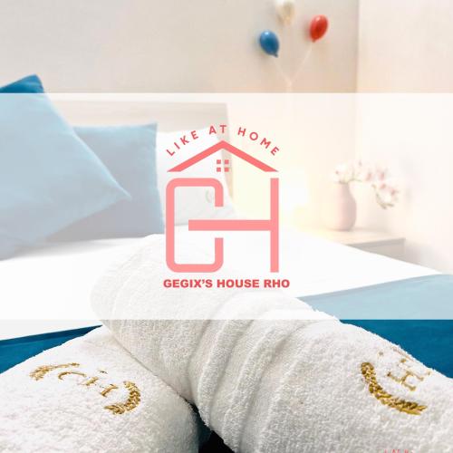 a sign that says wife at home on a bed at Gegix's House Rho in Rho