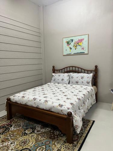 Tempat tidur dalam kamar di RUMAH CHANGGONG Studio