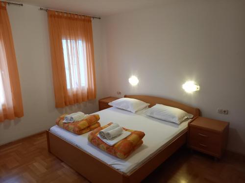 Ένα ή περισσότερα κρεβάτια σε δωμάτιο στο Villa Fontana