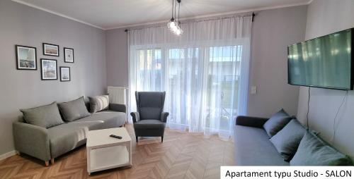 O zonă de relaxare la Apartamenty Słoneczna z Zielonym Tarasem