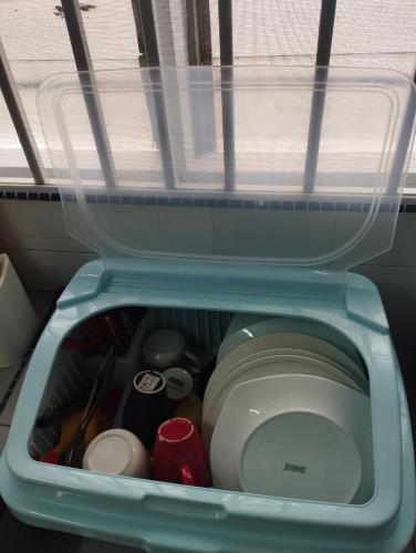 a drawer in a refrigerator filled with food at Batu Pahat Taman Banang Homestay in Batu Pahat