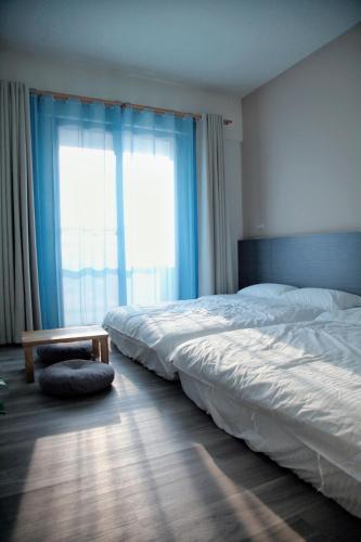 Meedori Coffee Home Stayにあるベッド