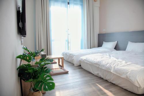 Meedori Coffee Home Stayにあるベッド
