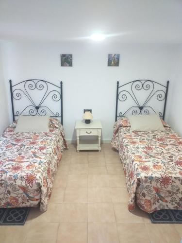 Postel nebo postele na pokoji v ubytování El Refugio