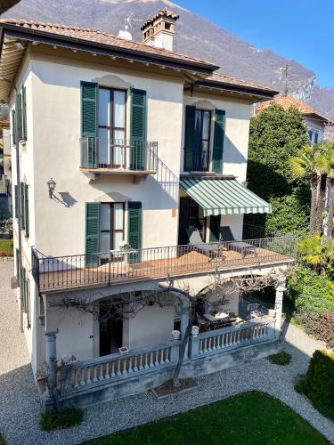 an aerial view of a house with a balcony at Villa Magnolia - Lake Como in Lenno