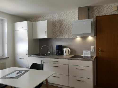 Kuchyň nebo kuchyňský kout v ubytování Haus Elisa
