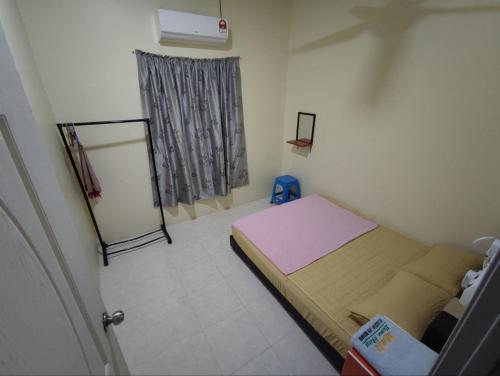Postel nebo postele na pokoji v ubytování Man Homestay