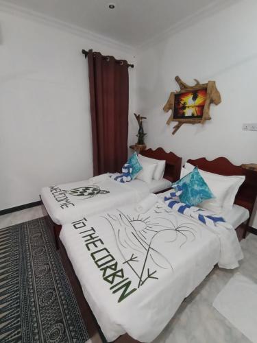 Cama o camas de una habitación en The Corbin Guest House