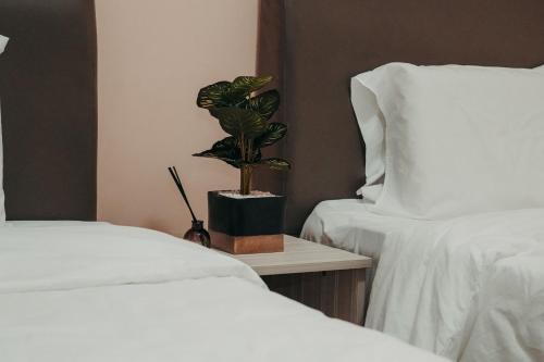 Ένα ή περισσότερα κρεβάτια σε δωμάτιο στο Gee homestay