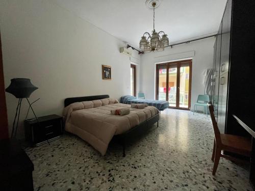 Il Cavalluccio Marino Room Sea View tesisinde bir odada yatak veya yataklar