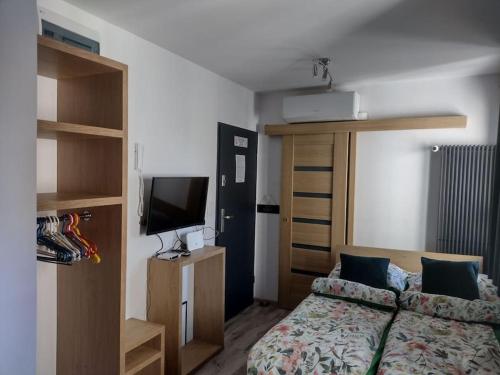 Posteľ alebo postele v izbe v ubytovaní A, Starówka mikroapartament Miodova