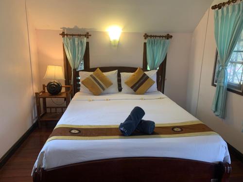 Postel nebo postele na pokoji v ubytování Seashell Resort Koh Tao-SHA Plus