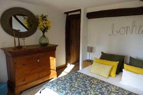 En eller flere senge i et værelse på Le Montillon