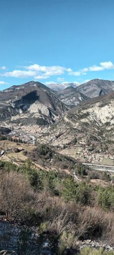 a view of a valley with mountains in the background at Le Panorama - Panoramic mountain view - very very quiet in Saint-Antonin