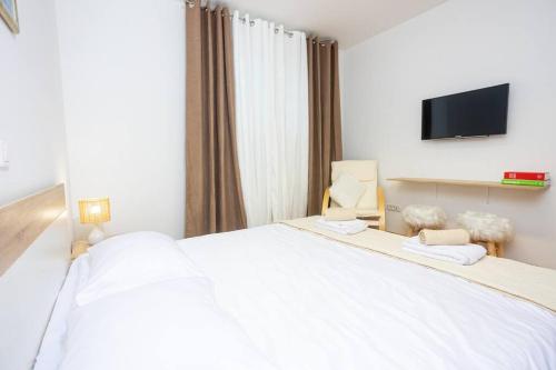 Ein Bett oder Betten in einem Zimmer der Unterkunft Bella vista - cozy apartment with a great view
