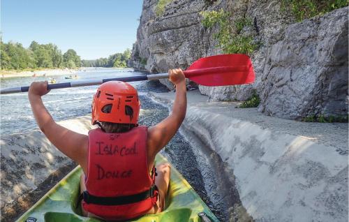 a person in a kayak on a river at Beautiful Home In Courry With Kitchen in Courry