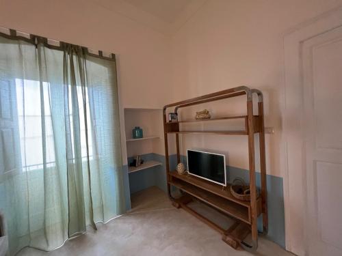 Телевизор и/или развлекательный центр в Casa Elia