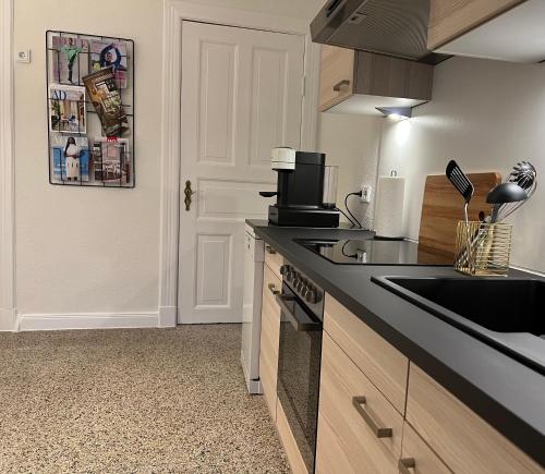 Ferienwohnung in Bad Bramstedtにあるキッチンまたは簡易キッチン