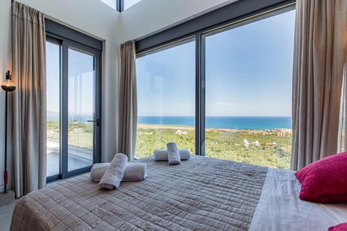 Posteľ alebo postele v izbe v ubytovaní Villas 107 - Homeleader