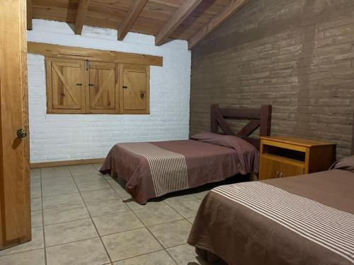 Postelja oz. postelje v sobi nastanitve Villa Rancho la Espuela