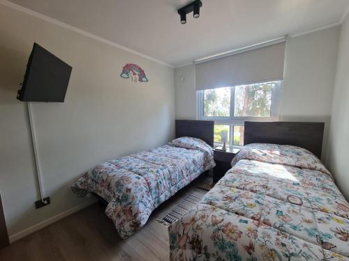 Postel nebo postele na pokoji v ubytování Lomas de Puyai