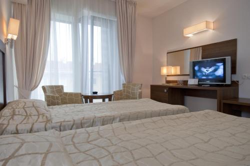 Ліжко або ліжка в номері Hotel Burgas