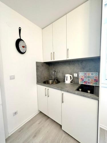 Kuchyň nebo kuchyňský kout v ubytování Lux Apartments Minja