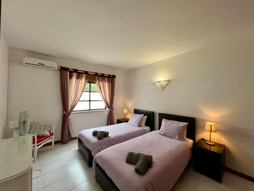 En eller flere senge i et værelse på Apartment 136 Carvoeiro