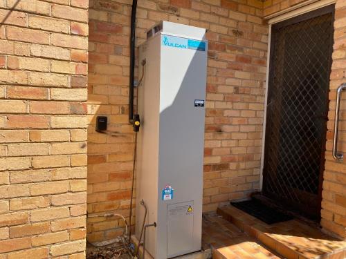a building with a machine in front of a brick wall at 6 Beds-Whole House with 4 bedrooms -Stawell - share accommodation - 2 rooms for 4 gusts are available in Stawell