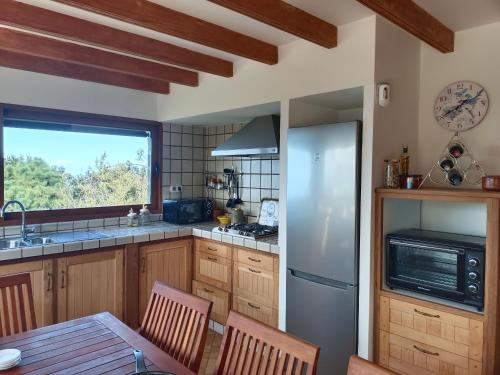 Kuchyň nebo kuchyňský kout v ubytování Finca Vistas al Teide con jacuzzi, wifi y TV satélite