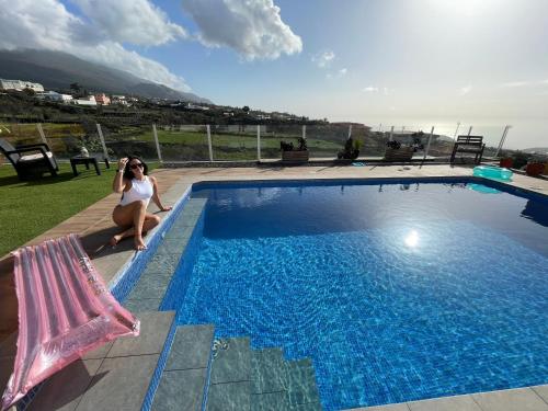 Bazén v ubytování 2 Dormitorios - Vistas Mar, Montaña y Volcán nebo v jeho okolí