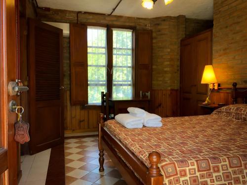 Hostal Las Golondrinasにあるベッド