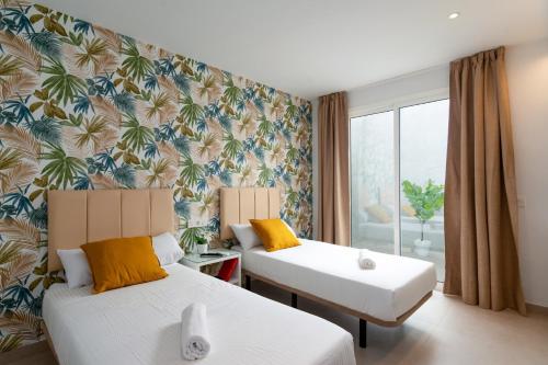 A bed or beds in a room at Villa Sapphire by Villa Plus