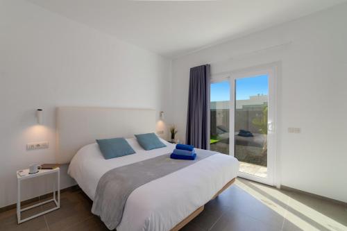 Postel nebo postele na pokoji v ubytování Villa Sibisse by Villa Plus
