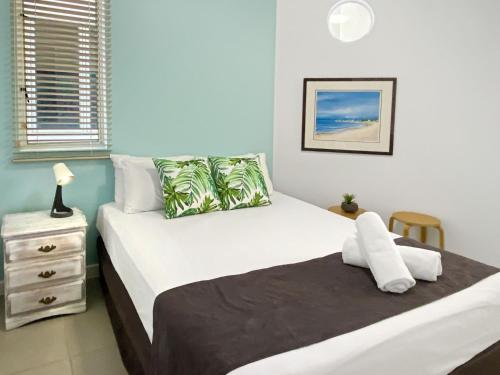 Katil atau katil-katil dalam bilik di Waters Edge Townhouse 3