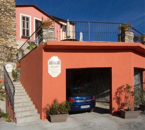 a car is parked in a garage at Appartamenti Chiarina in Dolcedo