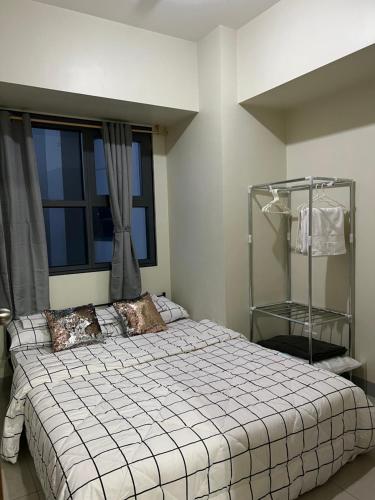Ένα ή περισσότερα κρεβάτια σε δωμάτιο στο Kristinas Homestay