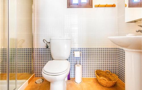 a bathroom with a toilet and a sink at 2 Bedroom Gorgeous Apartment In guilas in Águilas