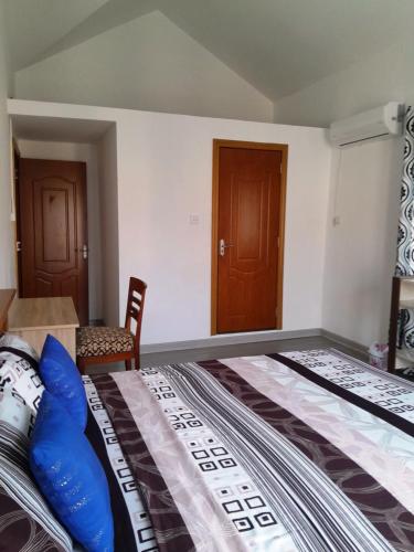 Postel nebo postele na pokoji v ubytování Lotus Villa, Résidences Le Chaumet, Pereybere