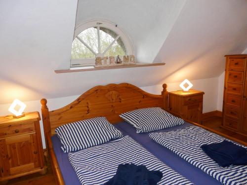 Postel nebo postele na pokoji v ubytování Haubarg am Meer
