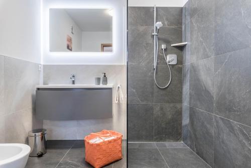 a bathroom with a shower and a sink at Trojer Apartment 2 in Sarntal