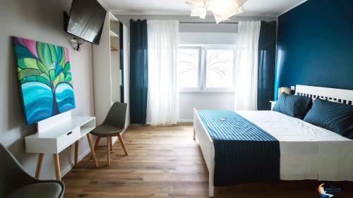 A bed or beds in a room at Baia di Luna
