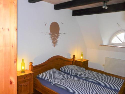 Postel nebo postele na pokoji v ubytování Haubarg am Meer