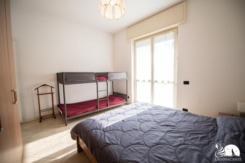 Posteľ alebo postele v izbe v ubytovaní Central Suite Moniga