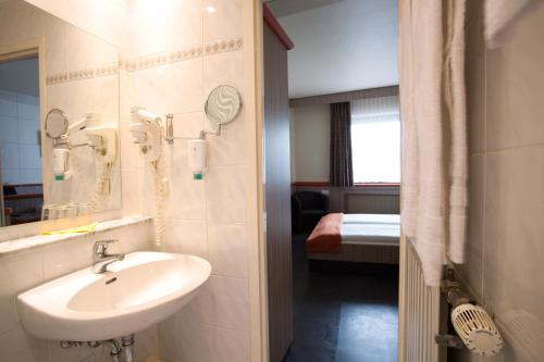 Un baño de Trip Inn Hotel Ariane