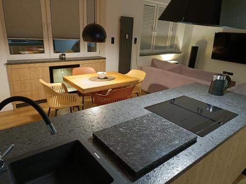 Kuchyň nebo kuchyňský kout v ubytování Apartament 3 Maja 4