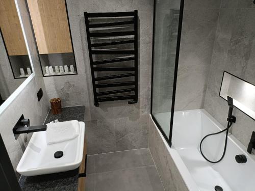 Ένα μπάνιο στο Apartament 3 Maja 4